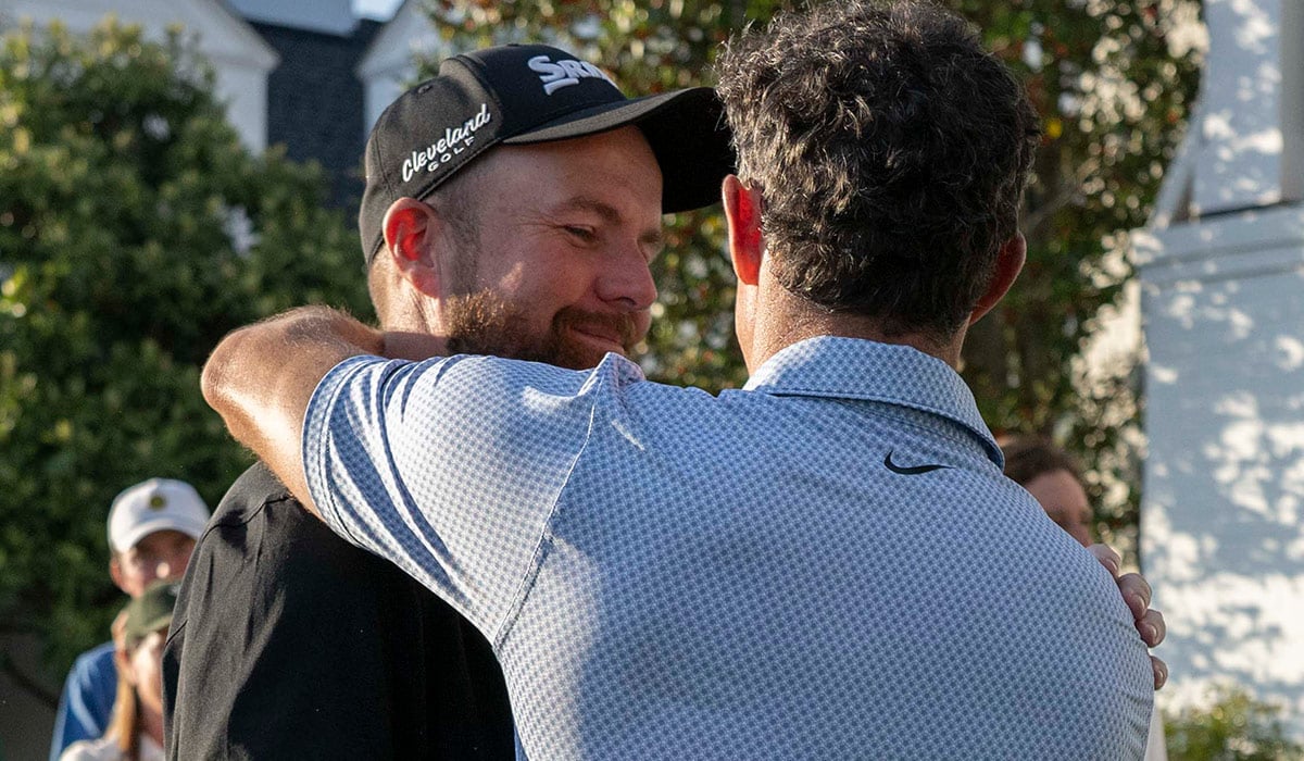 Masters champion Rory McIlroy of Northern Ireland celebrates with Shane Lowry of Ireland after winning back-to-back Masters at Augusta National Golf Club, Sunday, April 12, 2026. (Photo by Joel Marklund/Augusta National/Getty Images)