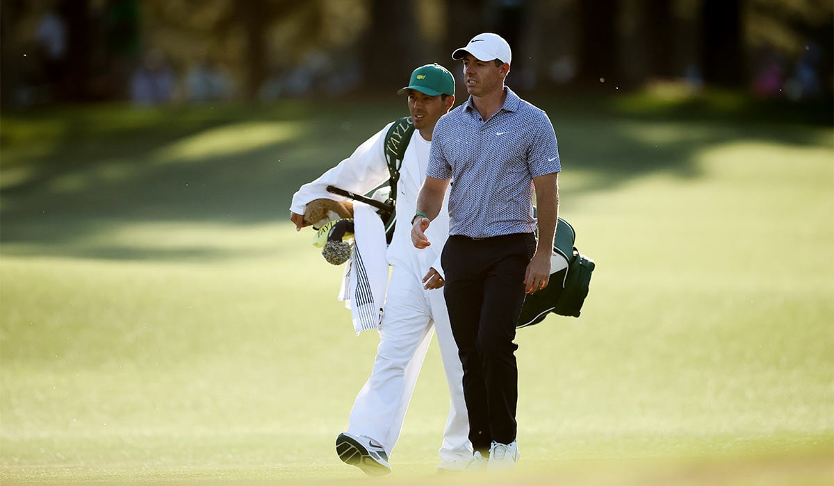 Rory McIlroy of Northern Ireland and his caddie Harry Diamond walk up the 17th hole during the third round of the 2026 Masters Tournament at Augusta National Golf Club. Pic: Getty Images