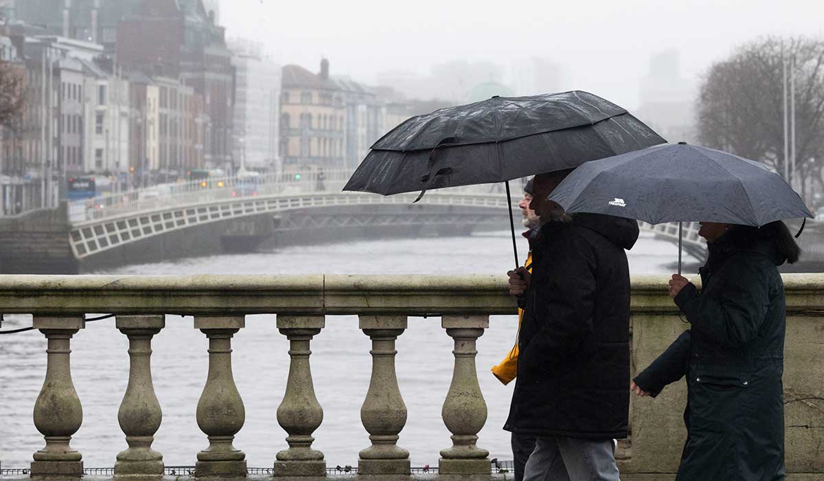 rain conditions, conditions 06.02.2026. . Photo Shows : people walk in the rain in Dublin Photo: Sam Boal/Collins Photos