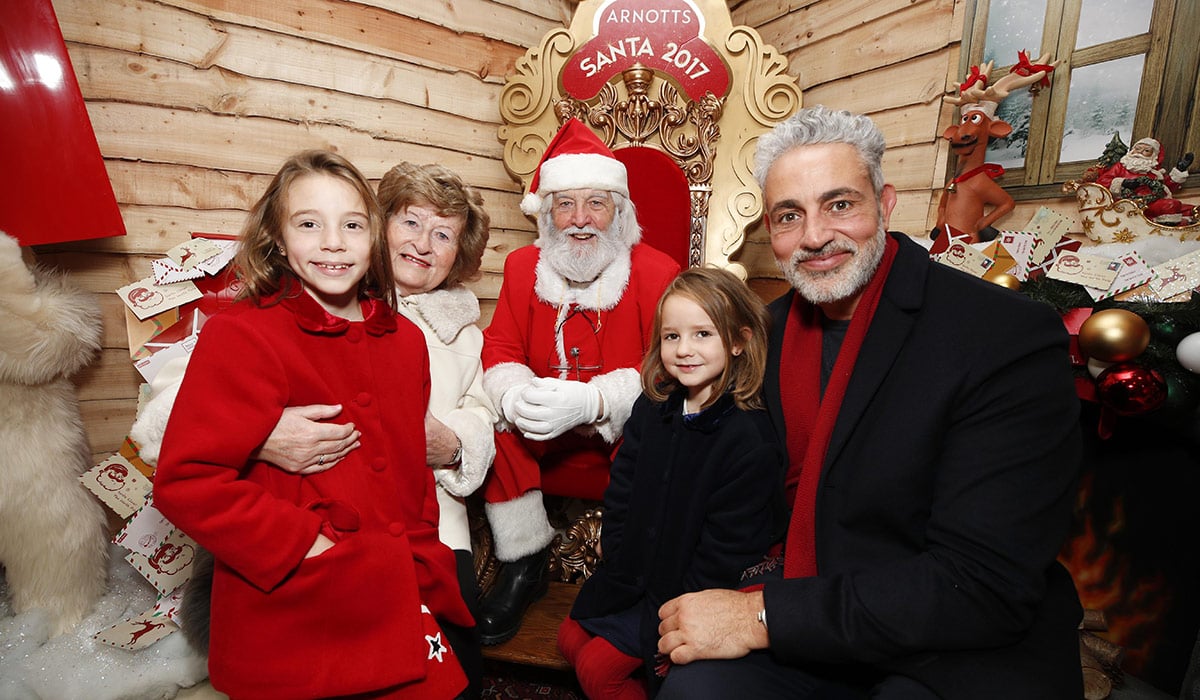 Baz Ashmawy with his mum Nancy and children Hannah (age 8) and Mahy (age 5) visiting Santa in his Grotto in Arnotts. Pic: Conor McCabe Photography