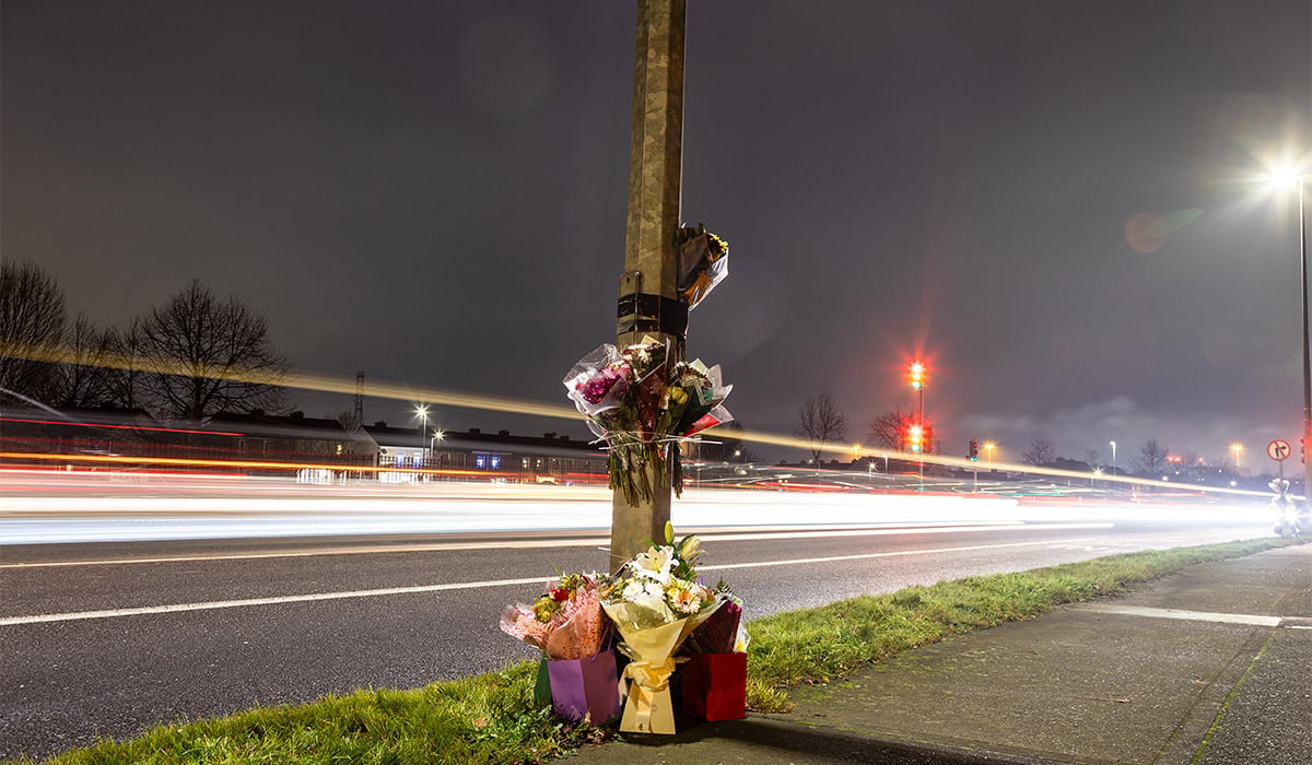 Floral tributes at the scene on Blanchardstown Road North, west Dublin, where two pedestrians were killed in a hit-and-run incident on Boxing Day. Pic: Evan Treacy/PA Wire