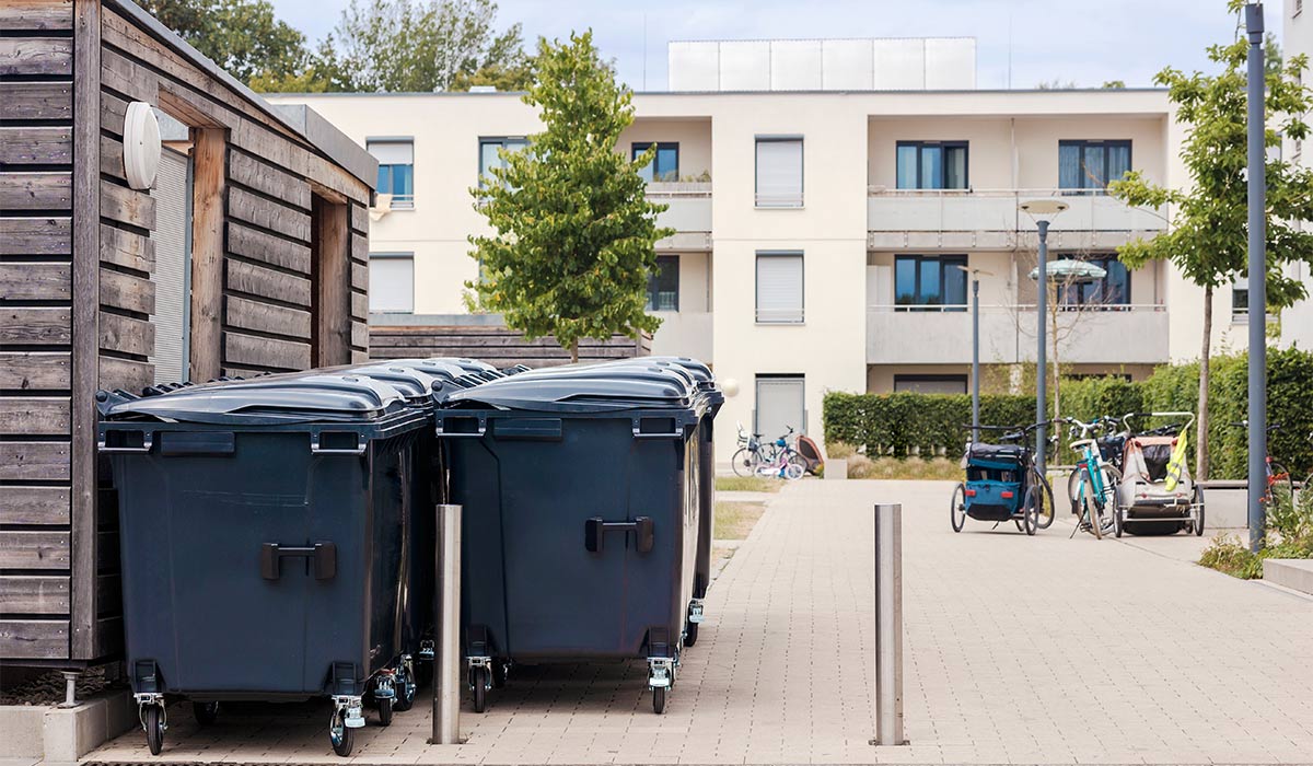 Garbage Cans or Trash Bin Row Front of Modern Apartment Building. City Containers with Waste for Recycling and Sorting Garbage. Waste Management. City Cleaning Service.; Shutterstock ID 2431214753; purchase_order: -; job: -; client: -; other: