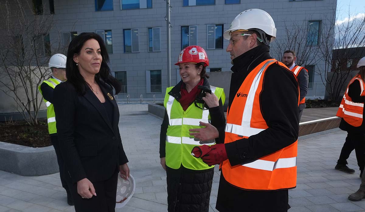 Minister for Health, Jennifer Carroll MacNeill speaking to Alasdair Henderson CEO Bam Ireland outside The New Children's Hospital, Dublin, where she met with Health Minister Mike Nesbitt to discuss north-south co-operation on health and social care issues. Picture date: Thursday February 27, 2025.