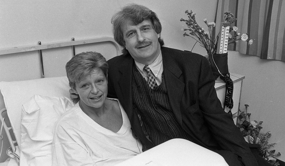 In a bed at Beaumont Hospital, Irish journalist Veronica Guerin (1958 - 1996) (left) speaks with her friend and editor at the Sunday Independent newspaper, Aengus Fanning (1942 - 2012), Dublin, Ireland, January 31, 1995. Pic: Getty Images