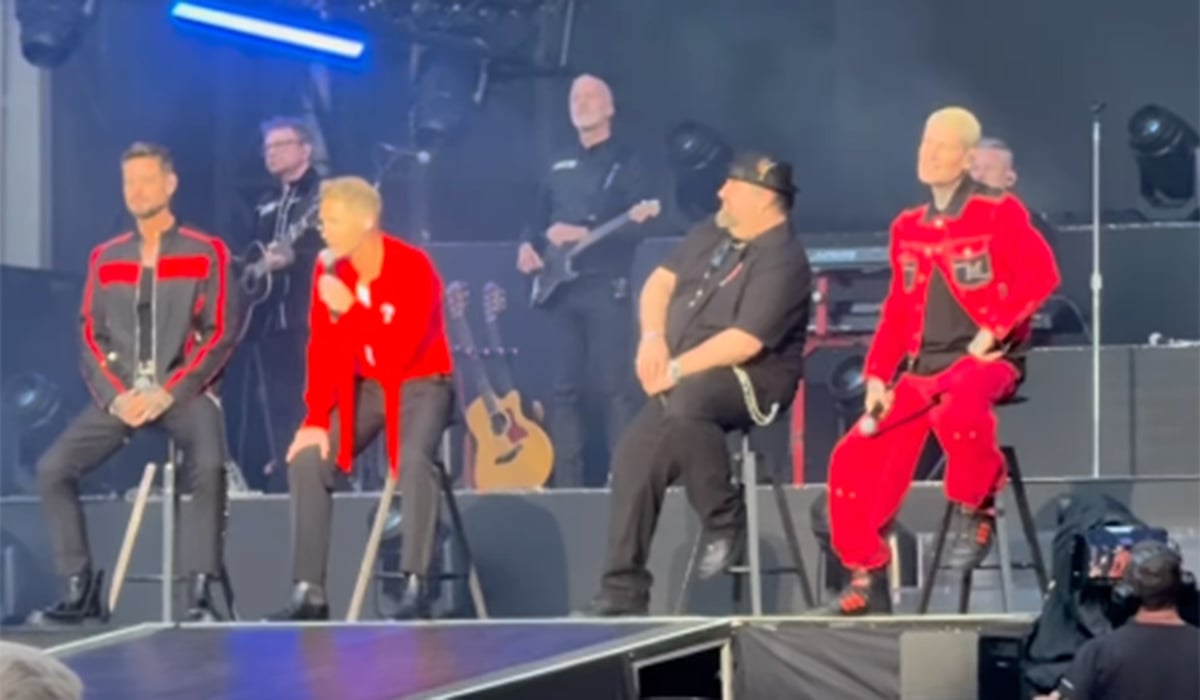 Boyzone on stage with Mikey. Pic: Instagram