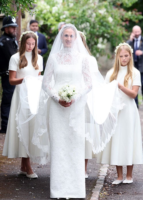 Harriet Sperling followed by her bridesmaids Georgina Sperling, Savannah Phillips and Isla Phillips. Pic: Getty Images