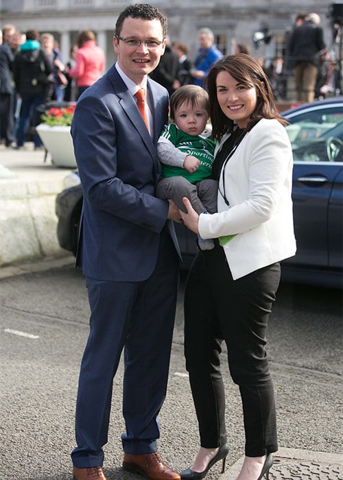 Fine gael TD Patrick O'Donovan with son John O'Donovan, 16 months old and wife Eileen O'Donovan arrive at the 32nd Dail at Leinster House. Pic: gareth chaney Collins