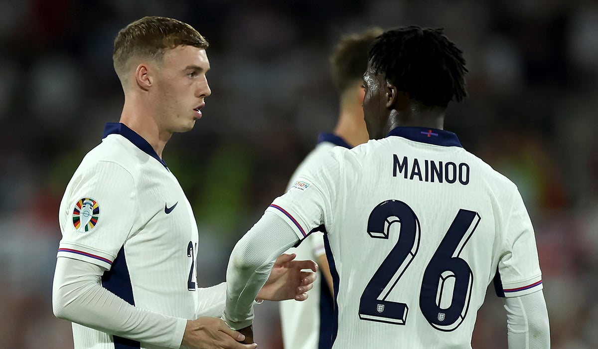 Cole Palmer and Kobbie Mainoo of England talk during the UEFA EURO 2024 group stage match between England and Slovenia at Cologne Stadium on June 25, 2024 in Cologne, Germany. Pic: Eddie Keogh/The FA via Getty Images