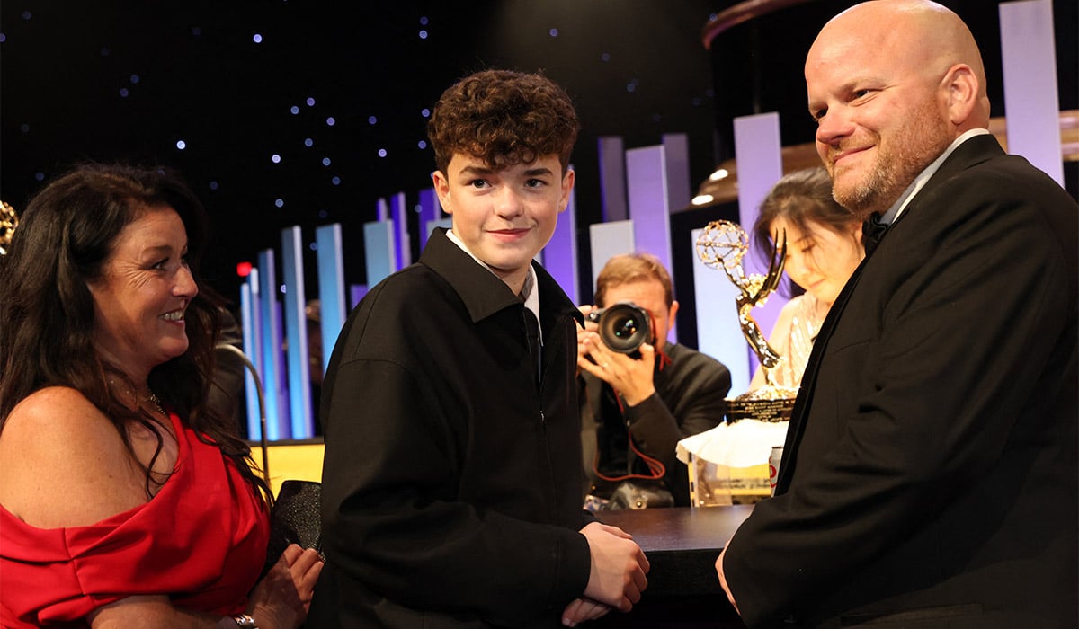 British actor and winner of the award for Outstanding Supporting Actor in a Limited or Anthology Series or Movie for "Adolescence" Owen Cooper (C) stands alongside his parents Noreen (R) and Andy Cooper (L) during the 77th Primetime Emmy Awards Governors Gala. Pic: Getty Images