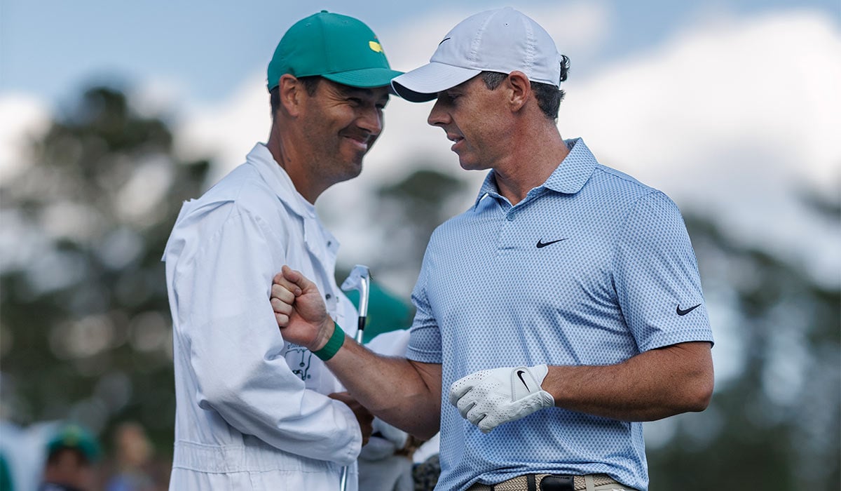 Masters champion Rory McIlroy of Northern Ireland and caddie Harry Diamond during the final round of the Masters at Augusta National Golf Club. Pic: Getty Images