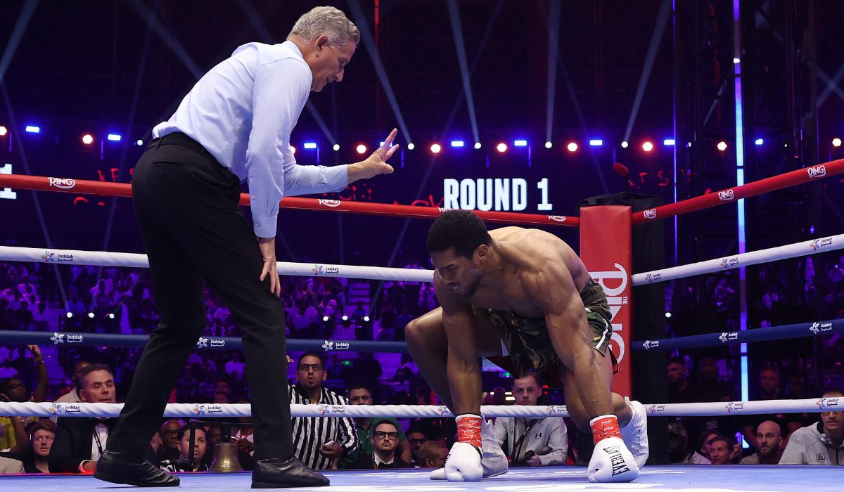 The referee giving a count to Anthony Joshua during the first round against Kristian Prenga. Pic: Richard Pelham/Getty Images