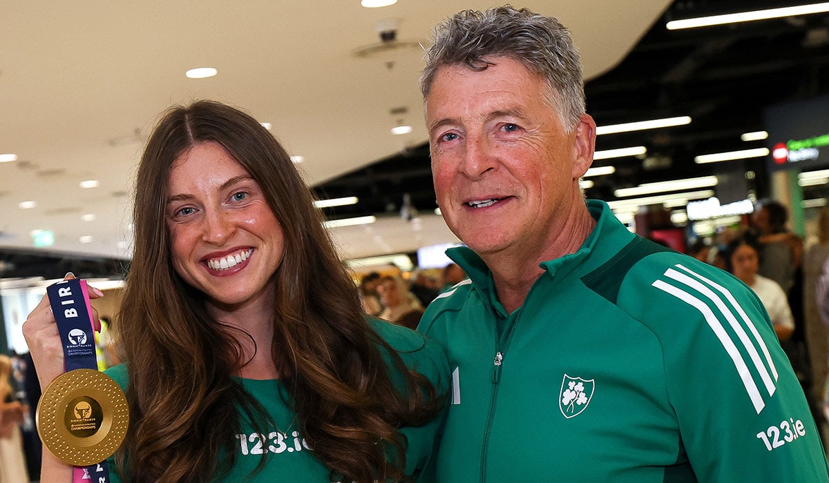 Kate O’Connor with her father and coach Michael O'Connor at Dublin Airport. Pic: INPHO/Ben Brady