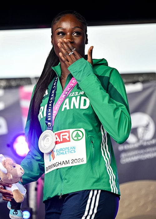 Rhasidat Adeleke of Ireland blows a kiss to supporters with her silver medal from the women's 200m, Pic: Sportsfile