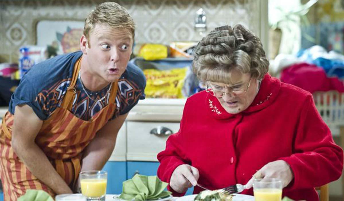 Gary Hollywood, who played lovable hairdresser Dino Doyle on the BBC One show Mrs Brown's Boys, was rumoured to have left after a huge money dispute. Pictured with Mrs Brown, played by Brendan O'Carroll. Pic: BBC