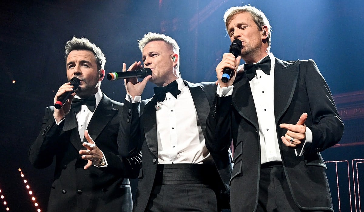 LONDON, ENGLAND - OCTOBER 27: Shane Filan, Nicky Byrne and Kian Egan of Westlife during their performance with the Royal Philharmonic Concert Orchestra at Royal Albert Hall on October 27, 2025 in London, England. (Photo by Nicky J. Sims/Getty Images)