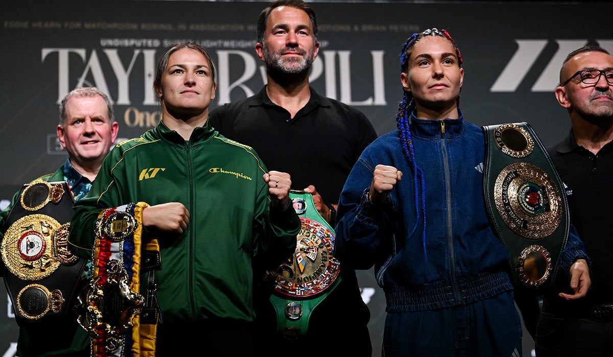 Katie Taylor with her manager Brian Peters, left, promoter Eddie Hearn, centre, and opponent Flora Pili and her trainer Pietro Pili during a press conference. Pic: Sportsfile