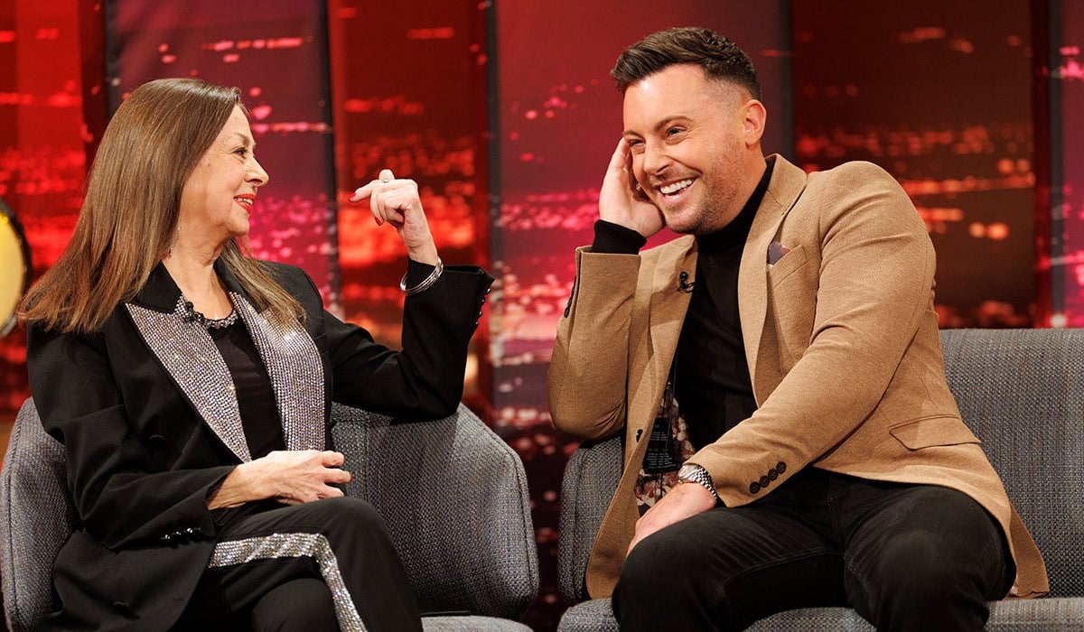 ***Embargoed until 23:00 02/10/2026*** Nathan Carter surprise as inducted into the Irish Country Music Hall of Fame on Friday night's RTÉ The Late Late Country Music Special pictured with last year’s inductee Sandy Kelly .Picture andres Poveda
