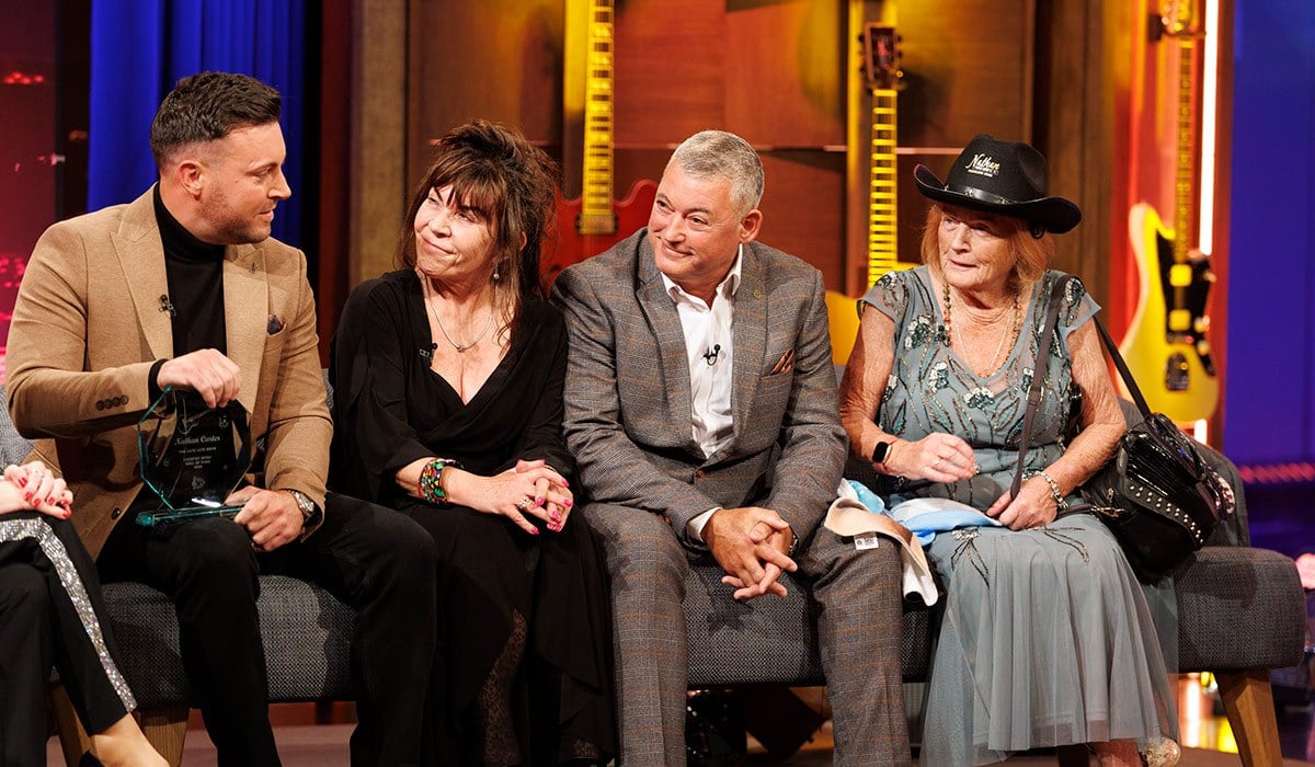 ***Embargoed until 23:00 02/10/2026*** Nathan Carter surprise as inducted into the Irish Country Music Hall of Fame on Friday night's RTÉ The Late Late Country Music Special pictured with mum Noreen and dad Ian and grandmother Ann McCoy. Picture Andres Poveda