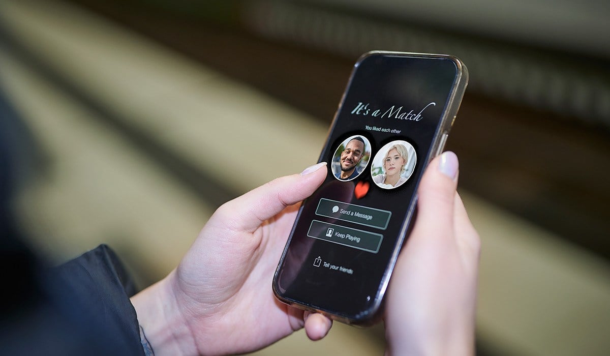 Close-up of a female using a dating app on smart phone