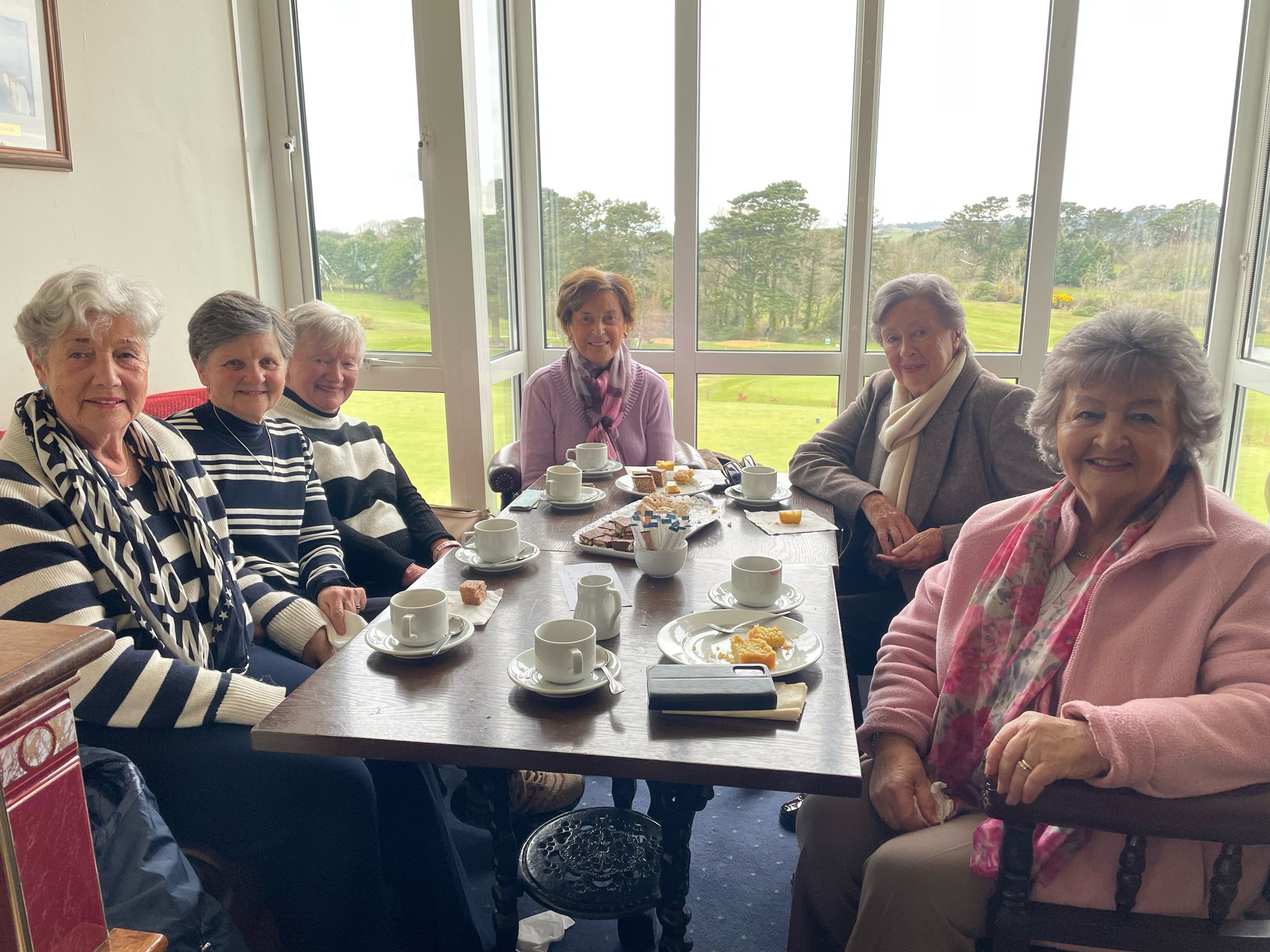 Ladies enjoying the drink tea for MND coffee morning at Tramore Golf Club