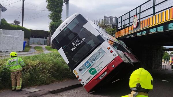 bus crashes into Cork railway bridge